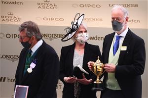 ASCOT, ENGLAND - JUNE 17: Owner Dr Jim Walker (R) looks on with the Gold Cup as Subjectivist wins the Gold Cup on Day Three of the Royal Ascot Meeting at Ascot Racecourse on June 17, 2021 in Ascot, England. A total of twelve thousand racegoers made up of Owners and the Public are permitted to attend the meeting due to it being an Events Research Programme (ERP) set up by the government due to the Coronavirus Pandemic. (Photo by Harry Trump/Getty Images)