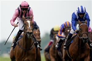 ASCOT, ENGLAND - JUNE 17: Robert Havlin riding Loving Dream (L, pink) win The Ribblesdale Stakes on Day Three of the Royal Ascot Meeting at Ascot Racecourse on June 17, 2021 in Ascot, England. A total of twelve thousand racegoers made up of owners and the public are permitted to attend the meeting due to it being an Events Research Programme (ERP) set up by the Government due to the Coronavirus pandemic. (Photo by Alan Crowhurst/Getty Images)