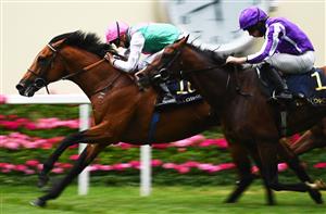 ASCOT, ENGLAND - JUNE 17: Hector Crouch on board Surefire on their way to winning the King George V Stakes on Day Three of the Royal Ascot Meeting at Ascot Racecourse on June 17, 2021 in Ascot, England. A total of twelve thousand racegoers made up of Owners and the Public are permitted to attend the meeting due to it being an Events Research Programme (ERP) set up by the government due to the Coronavirus Pandemic. (Photo by Harry Trump/Getty Images)