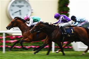 ASCOT, ENGLAND - JUNE 17: Hector Crouch on board Surefire on their way to winning the King George V Stakes on Day Three of the Royal Ascot Meeting at Ascot Racecourse on June 17, 2021 in Ascot, England. A total of twelve thousand racegoers made up of Owners and the Public are permitted to attend the meeting due to it being an Events Research Programme (ERP) set up by the government due to the Coronavirus Pandemic. (Photo by Harry Trump/Getty Images)