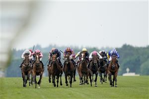 ASCOT, ENGLAND - JUNE 17: Robert Havlin riding Loving Dream (L, pink) win The Ribblesdale Stakes on Day Three of the Royal Ascot Meeting at Ascot Racecourse on June 17, 2021 in Ascot, England. A total of twelve thousand racegoers made up of owners and the public are permitted to attend the meeting due to it being an Events Research Programme (ERP) set up by the Government due to the Coronavirus pandemic. (Photo by Alan Crowhurst/Getty Images)