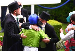ASCOT, ENGLAND - JUNE 17: Owner Dr Jim Walker interacts with Jockey Joe Fanning following Subjectivist winning the Gold Cup on Day Three of the Royal Ascot Meeting at Ascot Racecourse on June 17, 2021 in Ascot, England. A total of twelve thousand racegoers made up of Owners and the Public are permitted to attend the meeting due to it being an Events Research Programme (ERP) set up by the government due to the Coronavirus Pandemic. (Photo by Harry Trump/Getty Images)