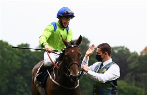 ASCOT, ENGLAND - JUNE 17: Joe Fanning celebrates on board Subjectivist with the groom after winning the Gold Cup on Day Three of the Royal Ascot Meeting at Ascot Racecourse on June 17, 2021 in Ascot, England. A total of twelve thousand racegoers made up of Owners and the Public are permitted to attend the meeting due to it being an Events Research Programme (ERP) set up by the government due to the Coronavirus Pandemic. (Photo by Harry Trump/Getty Images)