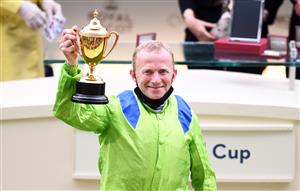 ASCOT, ENGLAND - JUNE 17: Jockey Joe Fanning celebrates with the Gold Cup after winning on board Subjectivist on Day Three of the Royal Ascot Meeting at Ascot Racecourse on June 17, 2021 in Ascot, England. A total of twelve thousand racegoers made up of Owners and the Public are permitted to attend the meeting due to it being an Events Research Programme (ERP) set up by the government due to the Coronavirus Pandemic. (Photo by Harry Trump/Getty Images)