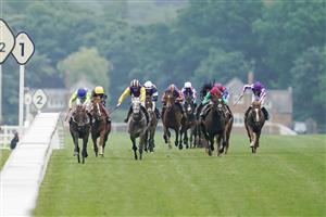 ASCOT, ENGLAND - JUNE 17: Joe Fanning riding Subjectivist (L, green) win The Gold Cup with Frankie Dettori riding Stradavarius (2L, yellow cap) finishing fourth on Day Three of the Royal Ascot Meeting at Ascot Racecourse on June 17, 2021 in Ascot, England. A total of twelve thousand racegoers made up of owners and the public are permitted to attend the meeting due to it being an Events Research Programme (ERP) set up by the Government due to the Coronavirus pandemic. (Photo by Alan Crowhurst/Getty Images)