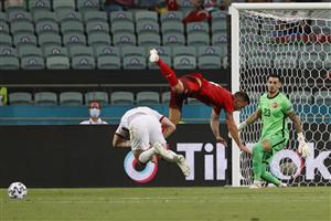 TOPSHOT - Switzerland's forward Haris Seferovic (C) and Turkey's defender Caglar Soyuncu fall during the UEFA EURO 2020 Group A football match between Switzerland and Turkey at the Olympic Stadium in Baku on June 20, 2021. (Getty Images)