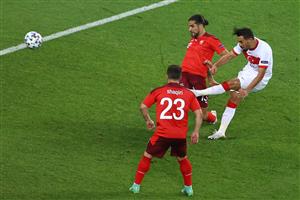 Turkey's midfielder Irfan Can Kahveci (R) scores his team's first goal during the UEFA EURO 2020 Group A football match between Switzerland and Turkey at the Olympic Stadium in Baku on June 20, 2021. (Getty Images)