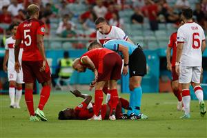 Switzerland's forward Breel Embolo lays injured during the UEFA EURO 2020 Group A football match between Switzerland and Turkey at the Olympic Stadium in Baku on June 20, 2021. (Getty Images)