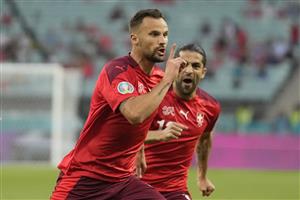 Switzerland's forward Haris Seferovic (L) celebrates scoring the opening goal with his teammates during the UEFA EURO 2020 Group A football match between Switzerland and Turkey at the Olympic Stadium in Baku on June 20, 2021. (Getty Images)