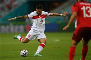 Turkey's midfielder Ozan Tufan (L) shoots during the UEFA EURO 2020 Group A football match between Switzerland and Turkey at the Olympic Stadium in Baku on June 20, 2021. (Getty Images)