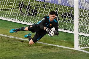 Belgium's goalkeeper Thibaut Courtois saves a shot during the UEFA EURO 2020 round of 16 football match between Belgium and Portugal at La Cartuja Stadium in Seville on June 27, 2021. (Getty Images)