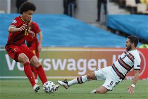 Portugal's midfielder Joao Moutinho (R) tackles Belgium's midfielder Axel Witsel during the UEFA EURO 2020 round of 16 football match between Belgium and Portugal at La Cartuja Stadium in Seville on June 27, 2021. (Getty Images)