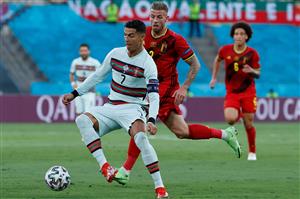 Portugal's forward Cristiano Ronaldo is challenged by Belgium's defender Toby Alderweireld (R) during the UEFA EURO 2020 round of 16 football match between Belgium and Portugal at La Cartuja Stadium in Seville on June 27, 2021. (Getty Images)