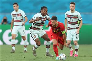 SEVILLE, SPAIN - JUNE 27: Eden Hazard of Belgium runs with the ball whilst under pressure from Renato Sanches of Portugal during the UEFA Euro 2020 Championship Round of 16 match between Belgium and Portugal at Estadio La Cartuja on June 27, 2021 in Seville, Spain. (Getty Images)