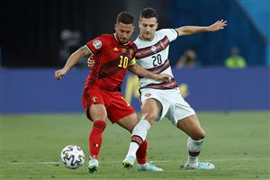SEVILLE, SPAIN - JUNE 27: Eden Hazard of Belgium battles for possession with Christian Benteke of Belgium during the UEFA Euro 2020 Championship Round of 16 match between Belgium and Portugal at Estadio La Cartuja on June 27, 2021 in Seville, Spain. (Getty Images)