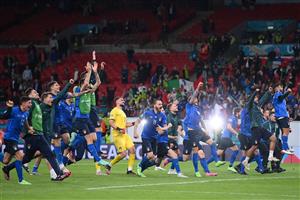 Italy players celebrate after winning the UEFA EURO 2020 semi-final football match between Italy and Spain at Wembley Stadium in London on July 6, 2021. (Getty Images)