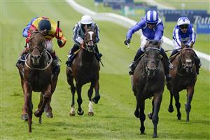 NEWMARKET, ENGLAND - JULY 08: Franny Norton riding Sir Ron Priestley (red/yellow) win The Princess Of Wales's Tattersalls Stakes from Jim Crowley and Al Aasy (white stripped cap) at Newmarket Racecourse on July 08, 2021 in Newmarket, England. Due to the Coronavirus pandemic, only owners along with a limited number of the paying public will be allowed to attend the meeting. (Photo by Alan Crowhurst/Getty Images)