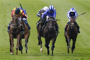 NEWMARKET, ENGLAND - JULY 08: Franny Norton riding Sir Ron Priestley (red/yellow) win The Princess Of Wales's Tattersalls Stakes from Jim Crowley and Al Aasy (white stripped cap) at Newmarket Racecourse on July 08, 2021 in Newmarket, England. Due to the Coronavirus pandemic, only owners along with a limited number of the paying public will be allowed to attend the meeting. (Photo by Alan Crowhurst/Getty Images)