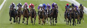 NEWMARKET, ENGLAND - JULY 08: Oisin Murphy riding Frankella (C, purple/light blue cap) win The British Stallion Studs EBF Maiden Fillies' Stakes at Newmarket Racecourse on July 08, 2021 in Newmarket, England. Due to the Coronavirus pandemic, only owners along with a limited number of the paying public will be allowed to attend the meeting. (Photo by Alan Crowhurst/Getty Images)