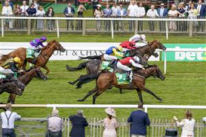 NEWMARKET, ENGLAND - JULY 08: Silvestre De Sousa riding Blackrod (red, white spotted cap) win The Each Way Extra At bet365 Handicap at Newmarket Racecourse on July 08, 2021 in Newmarket, England. Due to the Coronavirus pandemic, only owners along with a limited number of the paying public will be allowed to attend the meeting. (Photo by Alan Crowhurst/Getty Images)