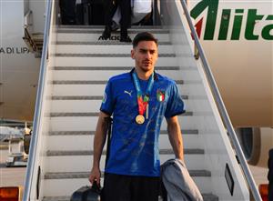 ROME, ITALY - JULY 12: Alex Meret walks off the plane after travelling back to Rome following the Euro 2020 victory on July 12, 2021 in Rome, Italy. (Getty Images)