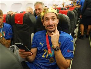 ROME, ITALY - JULY 12: captain Giorgio Chiellini is seen on the plane during the travel back to Rome following the Euro 2020 victory on July 12, 2021 in Rome, Italy. (Getty Images)