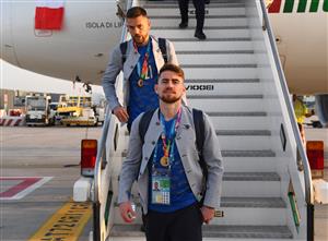 ROME, ITALY - JULY 12: Rafael Toloi and Jorginho walk off the plane after travelling back to Rome following the Euro 2020 victory on July 12, 2021 in Rome, Italy. (Getty Images)