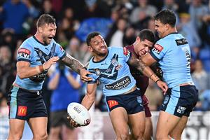 GOLD COAST, AUSTRALIA - JULY 14: Apisai Koroisau of the Blues celebrates with team mates after scoring a try during game three of the 2021 State of Origin Series between the New South Wales Blues and the Queensland Maroons at Cbus Super Stadium on July 14, 2021 in Gold Coast, Australia. (Photo by Bradley Kanaris/Getty Images)
