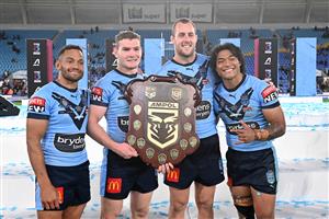 GOLD COAST, AUSTRALIA - JULY 14: (L-R) Apisai Koroisau of the Blues, Liam Martin of the Blues, Isaah Yeo of the Blues and Brian To'o of the Blues pose with the trophy after winning the series 2-1 after game three of the 2021 State of Origin Series between the New South Wales Blues and the Queensland Maroons at Cbus Super Stadium on July 14, 2021 in Gold Coast, Australia. (Photo by Bradley Kanaris/Getty Images)