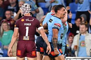 GOLD COAST, AUSTRALIA - JULY 14: Latrell Mitchell of the Blues celebrates the try scored by Jack Wighton of the Blues during game three of the 2021 State of Origin Series between the New South Wales Blues and the Queensland Maroons at Cbus Super Stadium on July 14, 2021 in Gold Coast, Australia. (Photo by Bradley Kanaris/Getty Images)