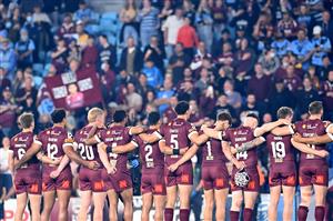 GOLD COAST, AUSTRALIA - JULY 14: The Maroons stand and sing the national anthem before game three of the 2021 State of Origin Series between the New South Wales Blues and the Queensland Maroons at Cbus Super Stadium on July 14, 2021 in Gold Coast, Australia. (Photo by Bradley Kanaris/Getty Images)