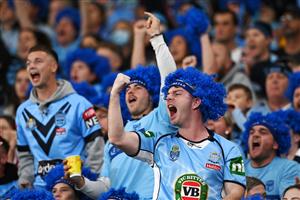 GOLD COAST, AUSTRALIA - JULY 14: Blues fans show their support during game three of the 2021 State of Origin Series between the New South Wales Blues and the Queensland Maroons at Cbus Super Stadium on July 14, 2021 in Gold Coast, Australia. (Photo by Bradley Kanaris/Getty Images)