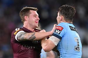 GOLD COAST, AUSTRALIA - JULY 14: Cameron Munster of the Maroons and Angus Crichton of the Blues scuffle during game three of the 2021 State of Origin Series between the New South Wales Blues and the Queensland Maroons at Cbus Super Stadium on July 14, 2021 in Gold Coast, Australia. (Photo by Bradley Kanaris/Getty Images)