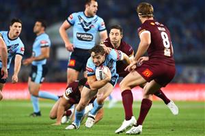 GOLD COAST, AUSTRALIA - JULY 14: Cameron Murray of the Blues is tackled during game three of the 2021 State of Origin Series between the New South Wales Blues and the Queensland Maroons at Cbus Super Stadium on July 14, 2021 in Gold Coast, Australia. (Photo by Chris Hyde/Getty Images)