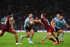 GOLD COAST, AUSTRALIA - JULY 14: James Tedesco of the Blues takes on the defence during game three of the 2021 State of Origin Series between the New South Wales Blues and the Queensland Maroons at Cbus Super Stadium on July 14, 2021 in Gold Coast, Australia. (Photo by Chris Hyde/Getty Images)