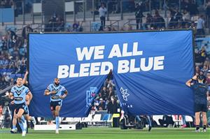 GOLD COAST, AUSTRALIA - JULY 14: James Tedesco of the Blues and Josh Addo-Carr of the Blues run onto the field during game three of the 2021 State of Origin Series between the New South Wales Blues and the Queensland Maroons at Cbus Super Stadium on July 14, 2021 in Gold Coast, Australia. (Photo by Bradley Kanaris/Getty Images)
