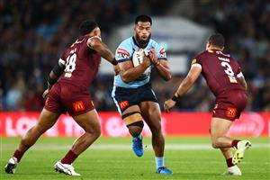 GOLD COAST, AUSTRALIA - JULY 14: Payne Haas of the Blues takes on the defence during game three of the 2021 State of Origin Series between the New South Wales Blues and the Queensland Maroons at Cbus Super Stadium on July 14, 2021 in Gold Coast, Australia. (Photo by Chris Hyde/Getty Images)