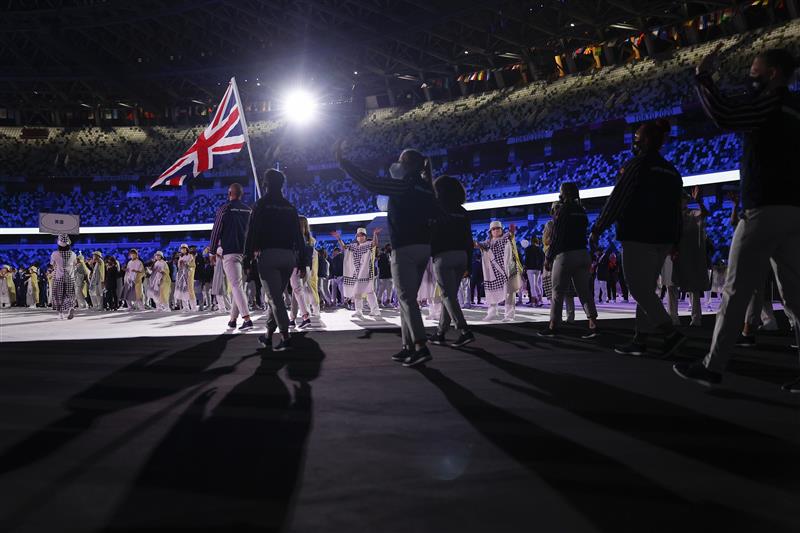 TOKYO, JAPAN - JULY 23: Flag bearers Hannah Mills and Mohamed Sbihi of Team Great Britain leads their team out during the Opening Ceremony of the Tokyo 2020 Olympic Games at Olympic Stadium on July 23, 2021 in Tokyo, Japan. (Getty Images)