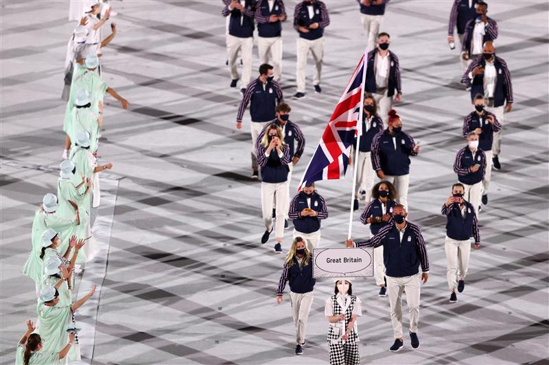 TOKYO, JAPAN - JULY 23: Flag bearers Hannah Mills and Mohamed Sbihi of Team Great Britain lead their team out during the Opening Ceremony of the Tokyo 2020 Olympic Games at Olympic Stadium on July 23, 2021 in Tokyo, Japan. (Getty Images)