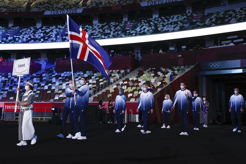 TOKYO, JAPAN - JULY 23: Flag bearers Snaefridur Sol Jorunnardottir and Anton Mckee of Team Iceland lead their team during the Opening Ceremony of the Tokyo 2020 Olympic Games at Olympic Stadium on July 23, 2021 in Tokyo, Japan. (Getty Images)