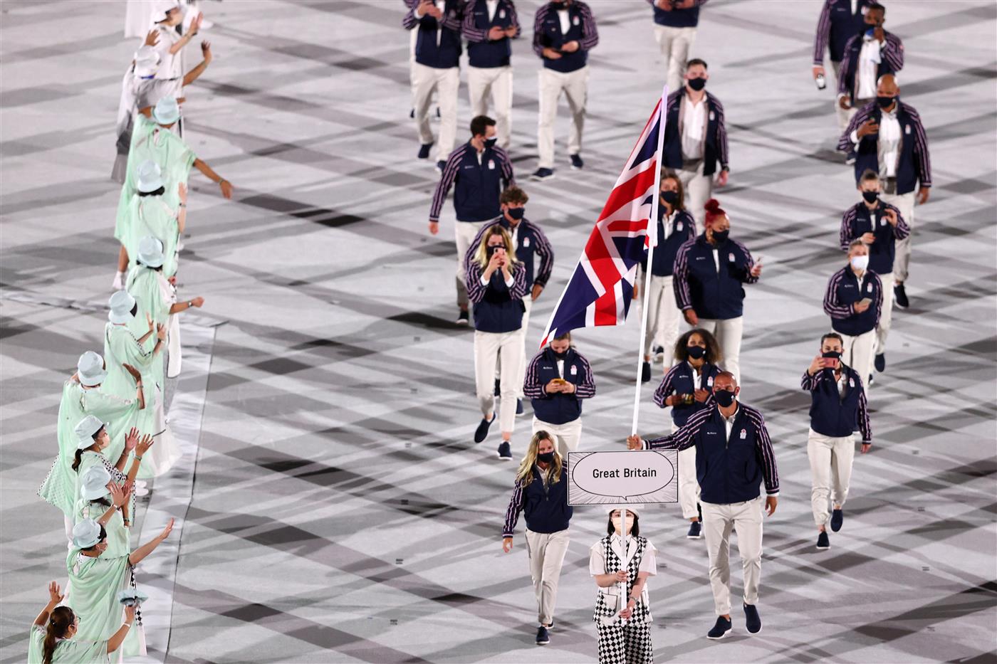 TOKYO, JAPAN - JULY 23: Flag bearers Hannah Mills and Mohamed Sbihi of Team Great Britain lead their team out during the Opening Ceremony of the Tokyo 2020 Olympic Games at Olympic Stadium on July 23, 2021 in Tokyo, Japan. (Getty Images)