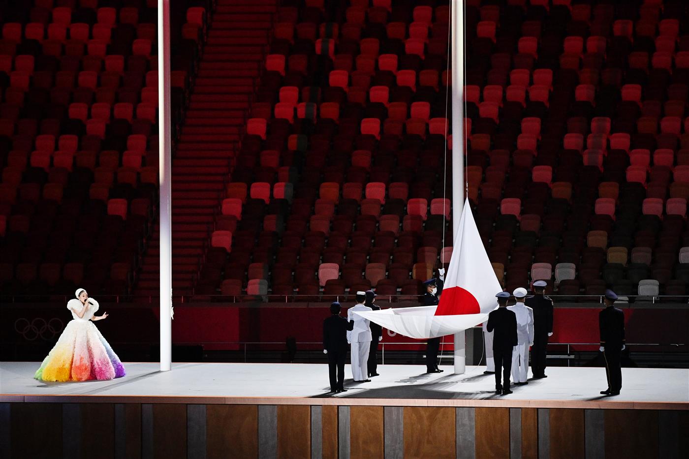 TOKYO, JAPAN - JULY 23: The Japan Flag is raised as the national anthem is sung during the Opening Ceremony of the Tokyo 2020 Olympic Games at Olympic Stadium on July 23, 2021 in Tokyo, Japan. (Getty Images)