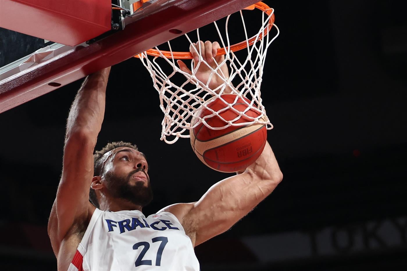 France's Rudy Gobert scores a basket in the men's preliminary round group A basketball match between France and USA during the Tokyo 2020 Olympic Games at the Saitama Super Arena in Saitama on July 25, 2021. (Getty Images)