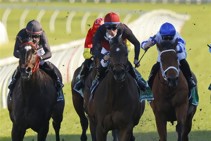SYDNEY, AUSTRALIA - AUGUST 07: Tommy Berry on Phobetor (black with red cap) wins race 7 the Heineken Missile Stakes Sydney Racing at Royal Randwick Racecourse on August 07, 2021 in Sydney, Australia. (Photo by Mark Evans/Getty Images)