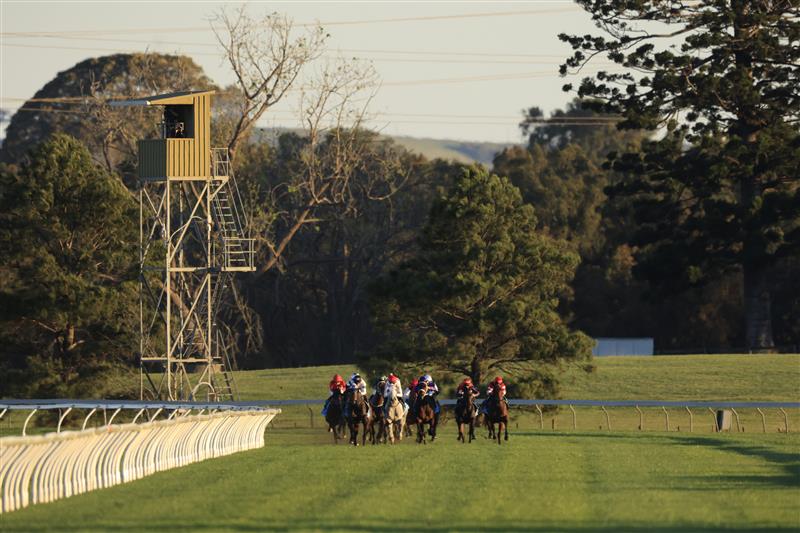 KEMBLA GRANGE, AUSTRALIA - SEPTEMBER 11: Riders at the home turn in race 10 during Sydney Racing at Kembla Grange Racecourse on September 11, 2021 in Kembla Grange, Australia. (Photo by Mark Evans/Getty Images)