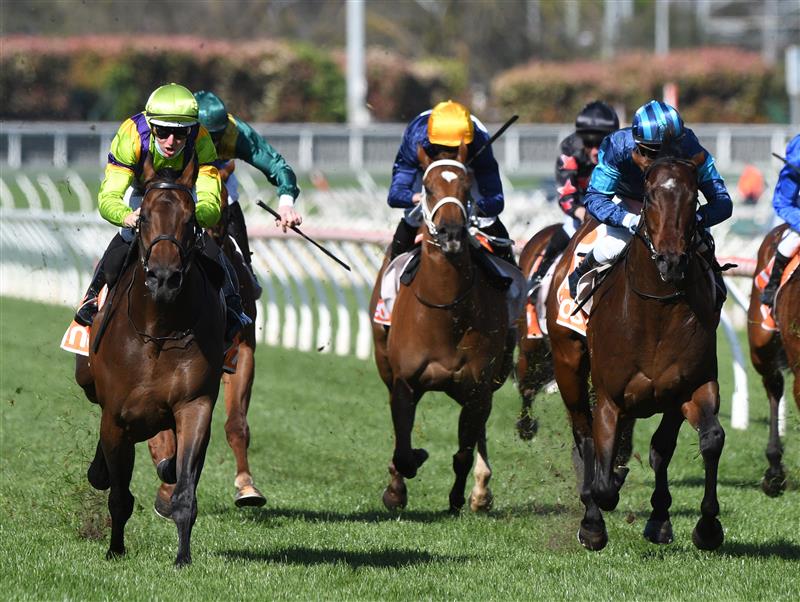 MELBOURNE, AUSTRALIA - SEPTEMBER 18: Damian Lane riding General Beau winning  race 5,  the Pinchapoo Plate, during Melbourne Racing at Caulfield Racecourse on September 18, 2021 in Melbourne, Australia. (Photo by Vince Caligiuri/Getty Images)