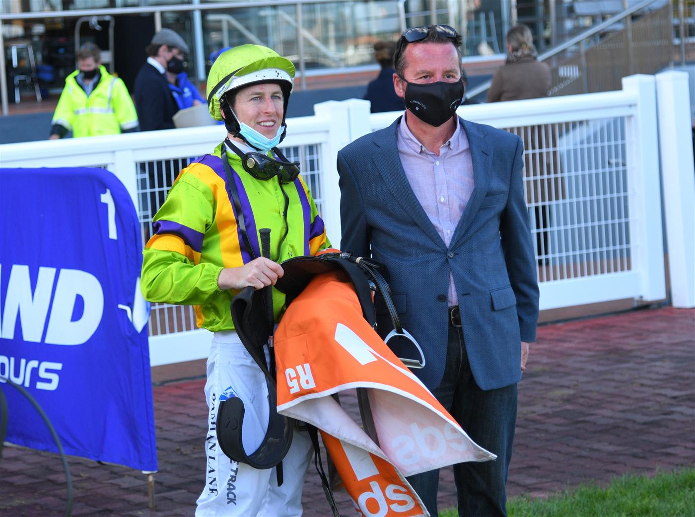 MELBOURNE, AUSTRALIA - SEPTEMBER 18: Damian Lane poses with Trainer Matthew Ellerton after riding General Beau to win race 5,  the Pinchapoo Plate, during Melbourne Racing at Caulfield Racecourse on September 18, 2021 in Melbourne, Australia. (Photo by Vince Caligiuri/Getty Images)