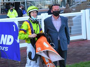 MELBOURNE, AUSTRALIA - SEPTEMBER 18: Damian Lane poses with Trainer Matthew Ellerton after riding General Beau to win race 5,  the Pinchapoo Plate, during Melbourne Racing at Caulfield Racecourse on September 18, 2021 in Melbourne, Australia. (Photo by Vince Caligiuri/Getty Images)