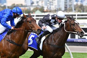 MELBOURNE, AUSTRALIA - SEPTEMBER 22: Patrick Moloney riding Cavalla defeats Damien Oliver riding Contemporary to win Race 2, the Darley Spring Preview, during Melbourne Racing at Flemington Racecourse on September 22, 2021 in Melbourne, Australia. (Photo by Vince Caligiuri/Getty Images)