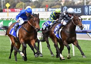 MELBOURNE, AUSTRALIA - SEPTEMBER 22: Patrick Moloney riding Cavalla defeats Damien Oliver riding Contemporary to win Race 2, the Darley Spring Preview, during Melbourne Racing at Flemington Racecourse on September 22, 2021 in Melbourne, Australia. (Photo by Vince Caligiuri/Getty Images)